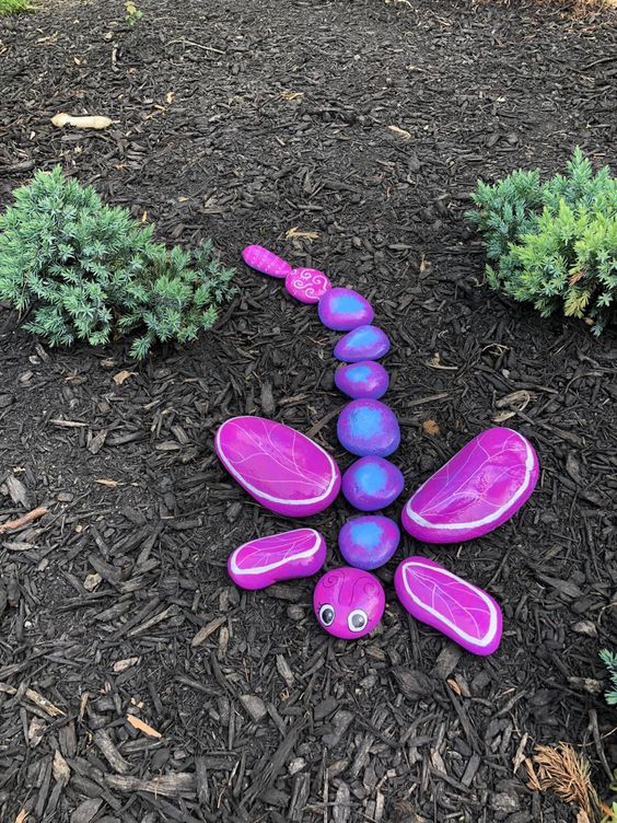 Vibrant Dragonfly Pebble Art