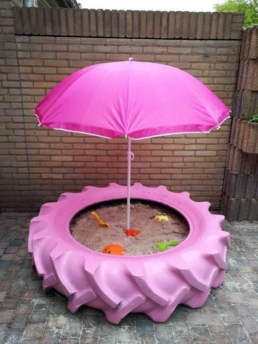 Colorful Tire Sandbox with Umbrella Shade