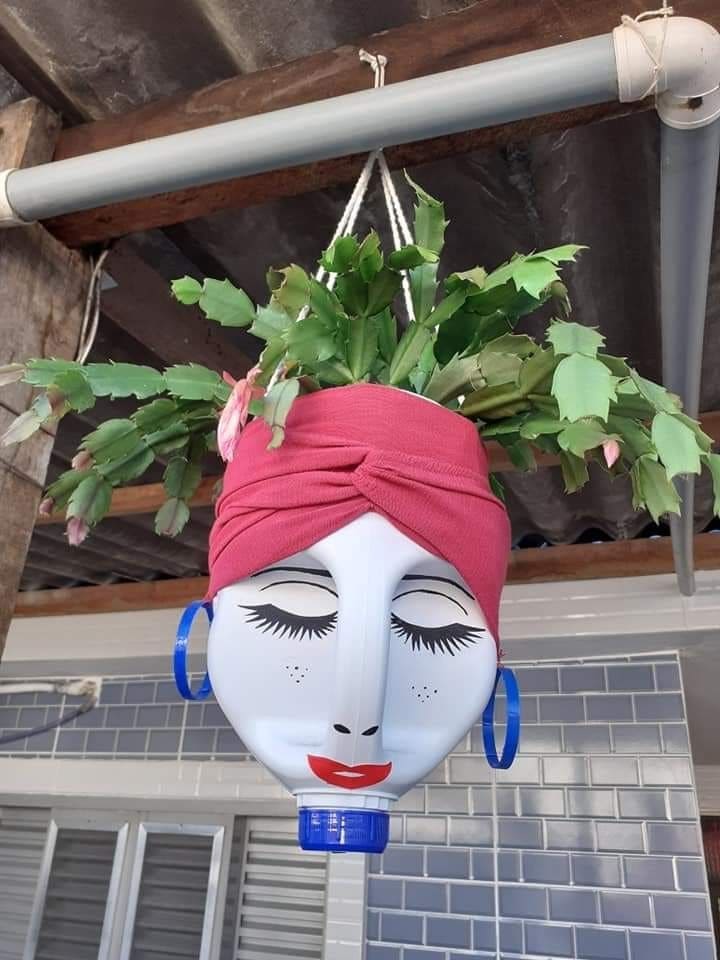 Creative Milk Jug Face Planter Design